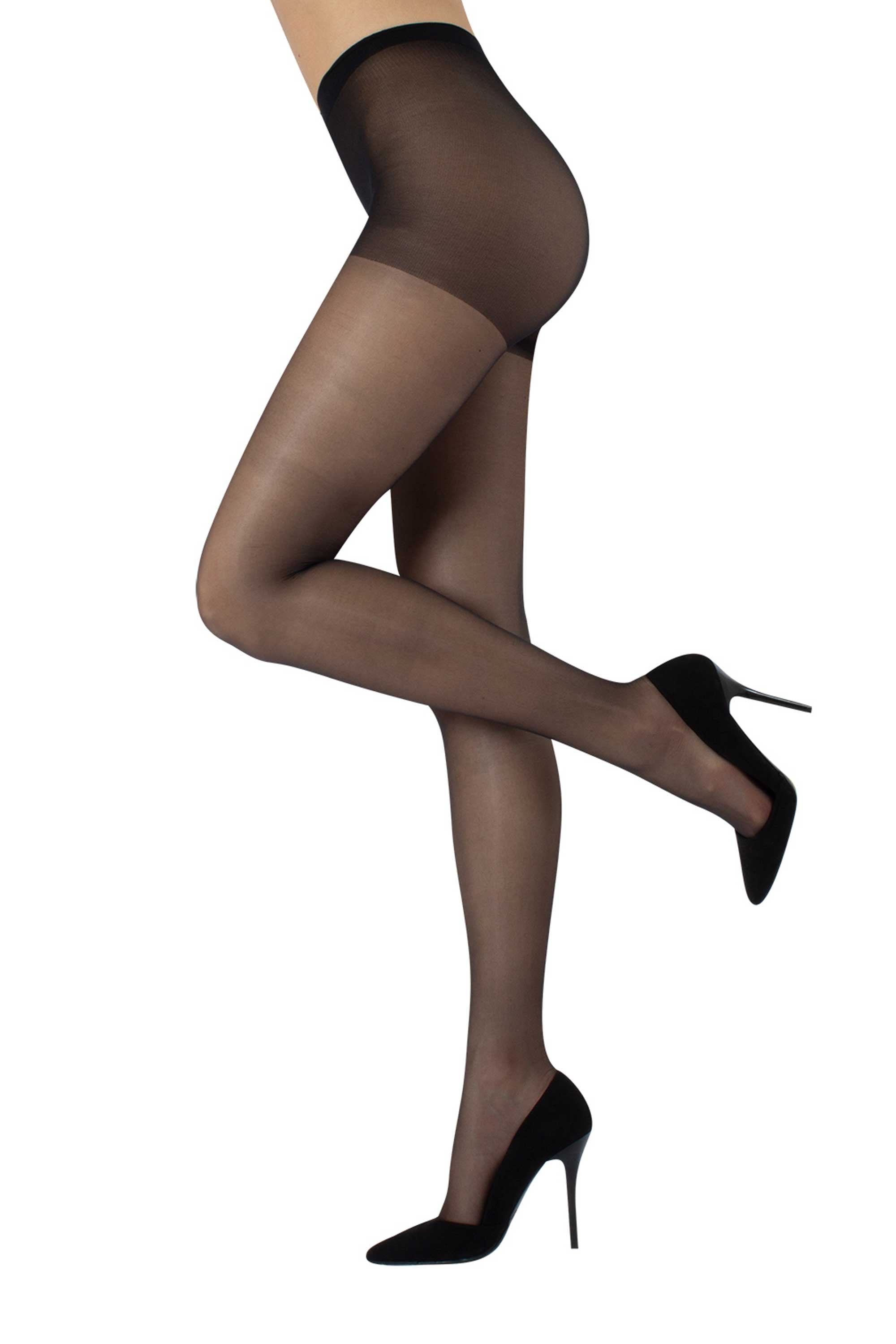 Black sheer tights worn with black high heels on a white background