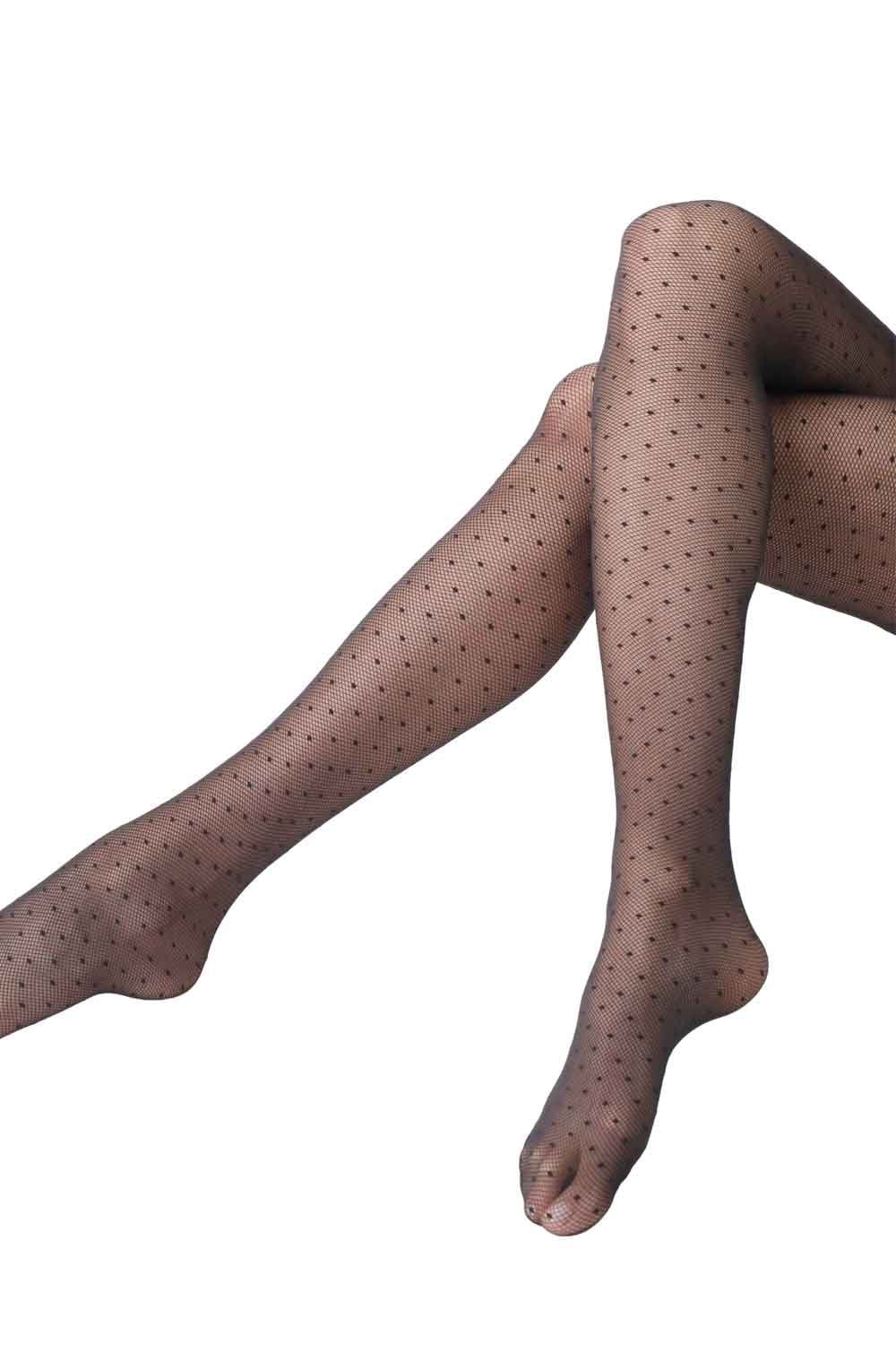 Polka dot tights worn by a person on a white background