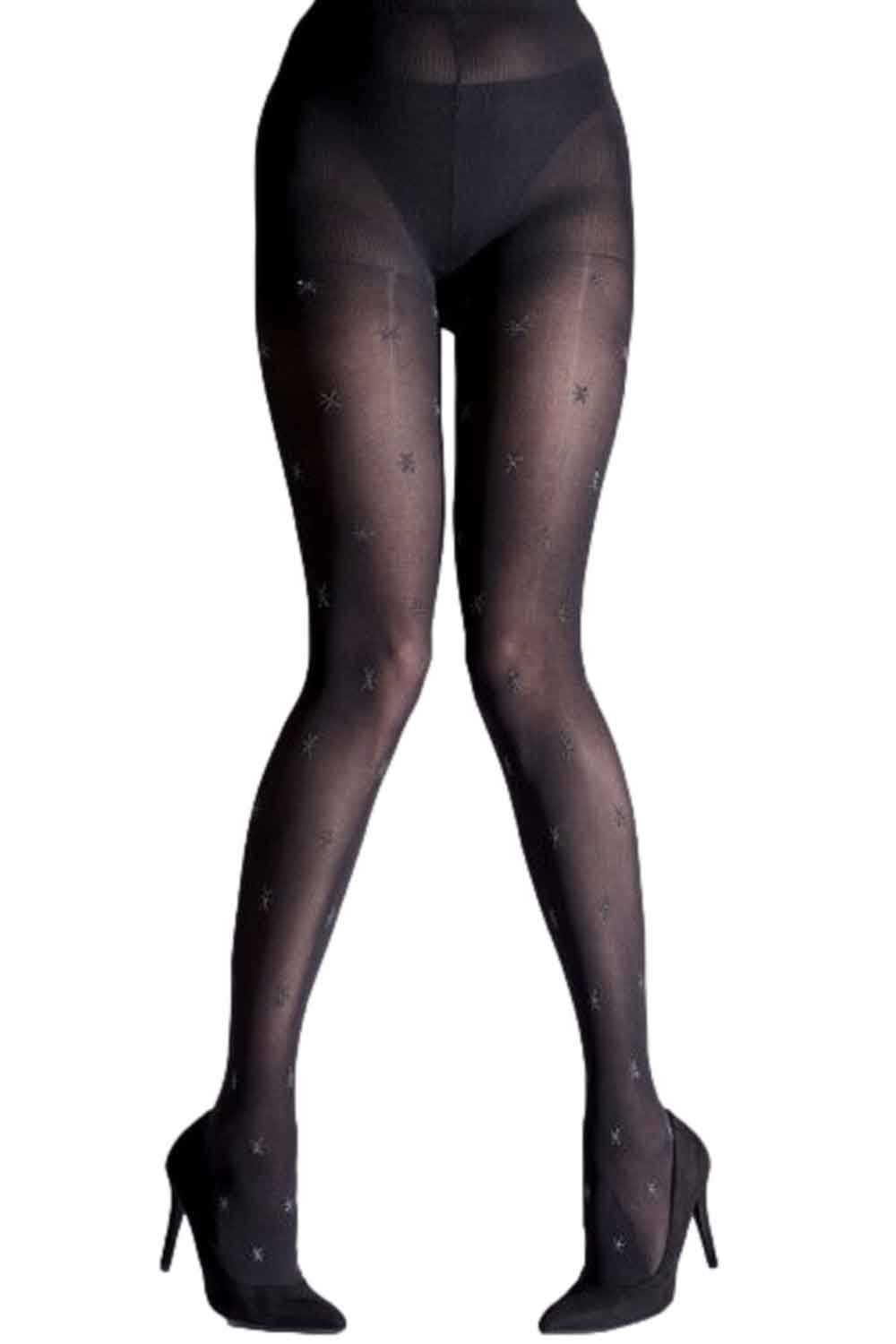 Black tights with stars  worn by a model on a white background