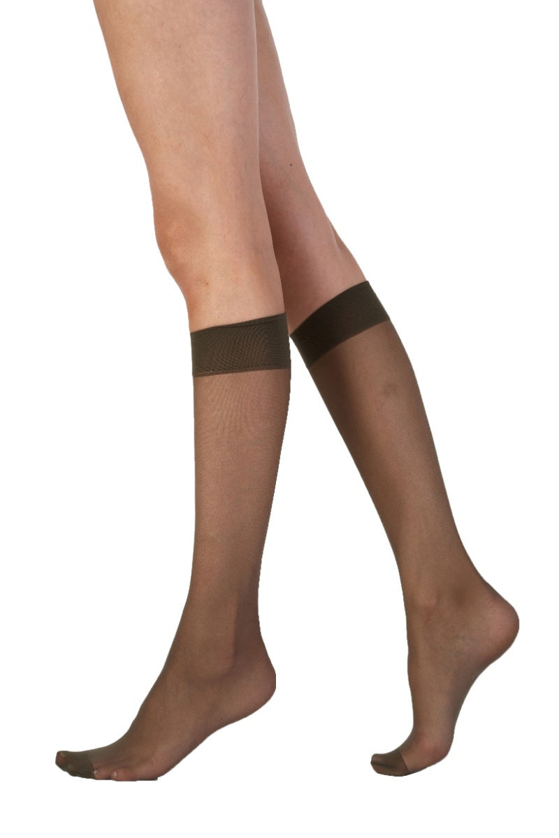 Barley Black  knee-high socks worn by a person on a white background