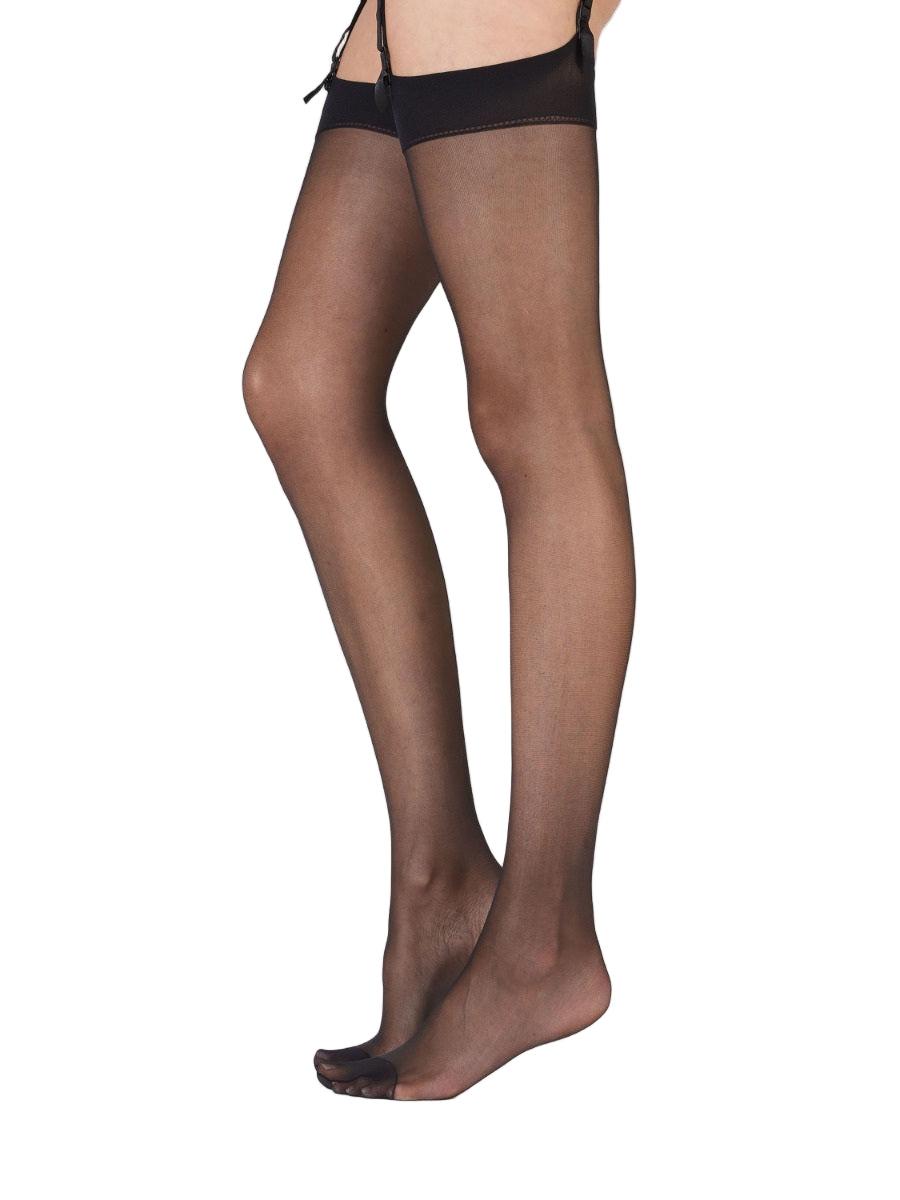 Black sheer stockings worn by a person on a white background