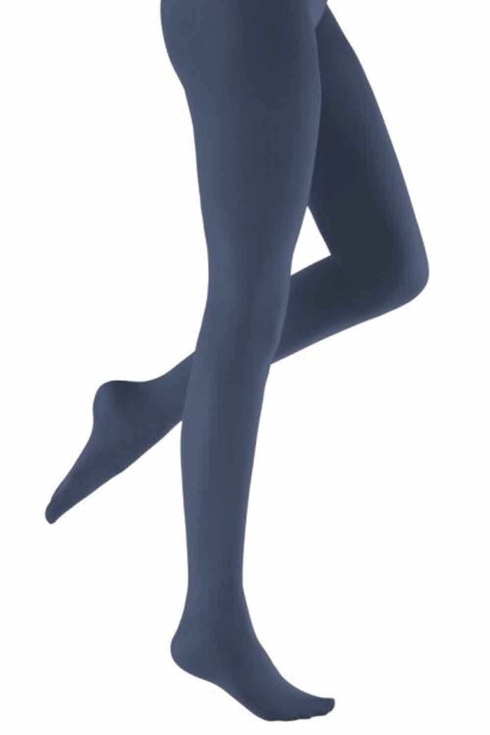 Navy blue tights worn by a person on a white background