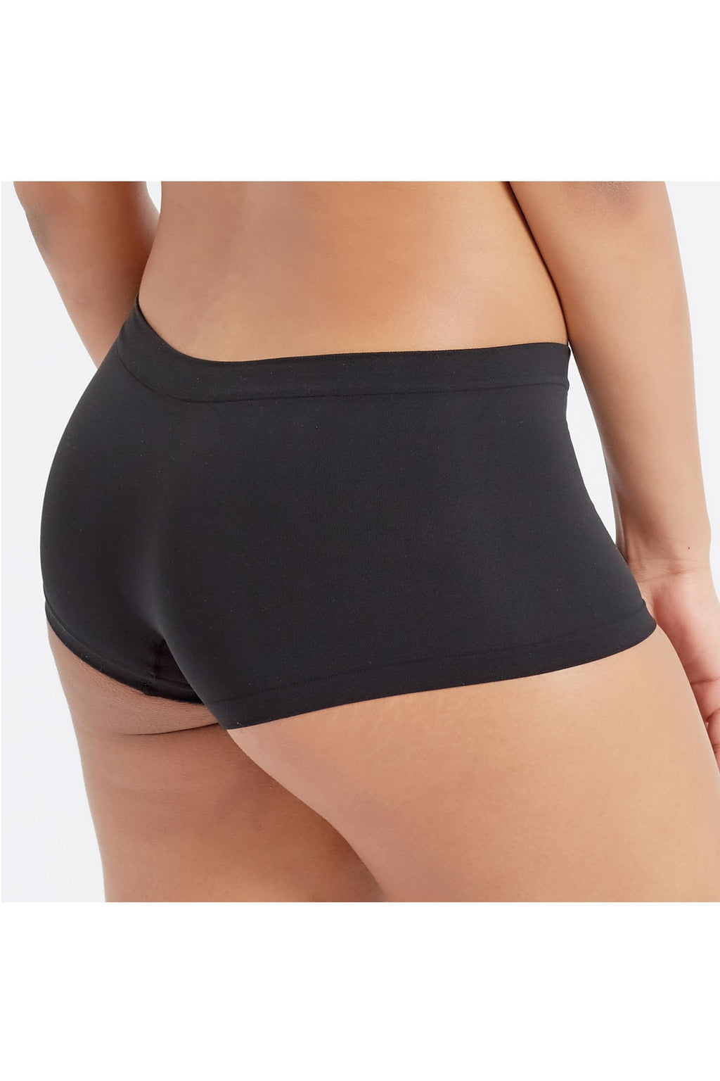 Black shorts worn by a person on a white background