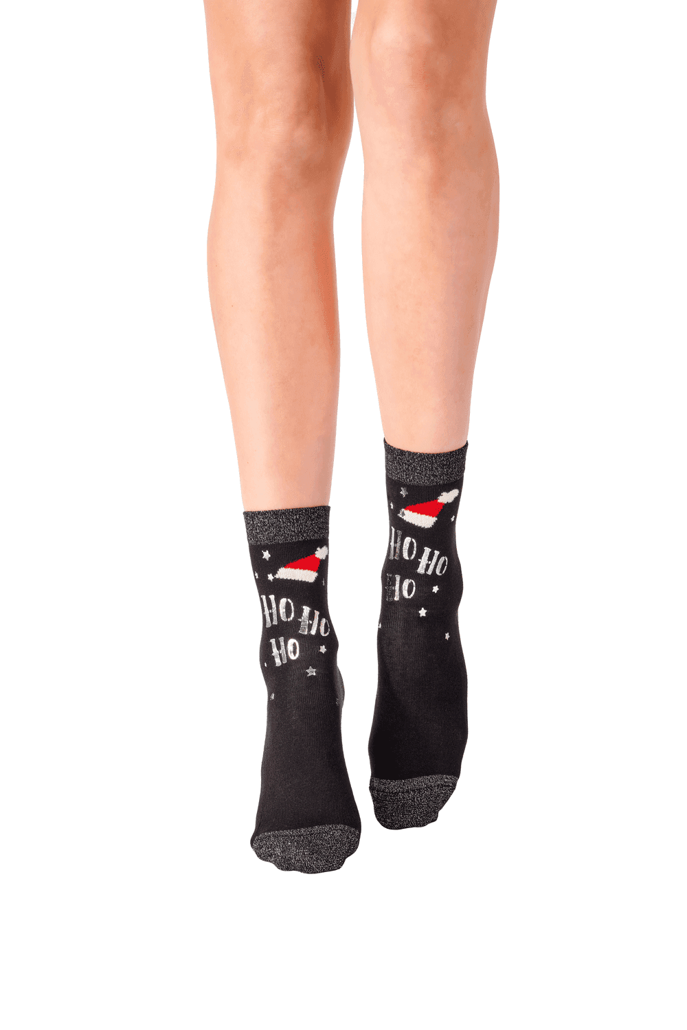 Black socks with Santa hats and 'Ho Ho Ho' text worn by a person on a white background