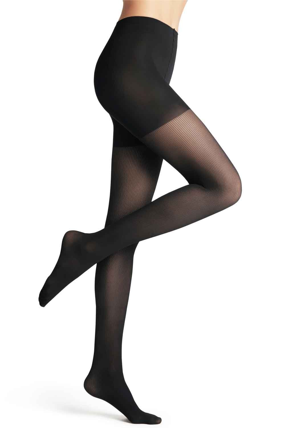 Black rib shaping  tights worn by a model on a white background