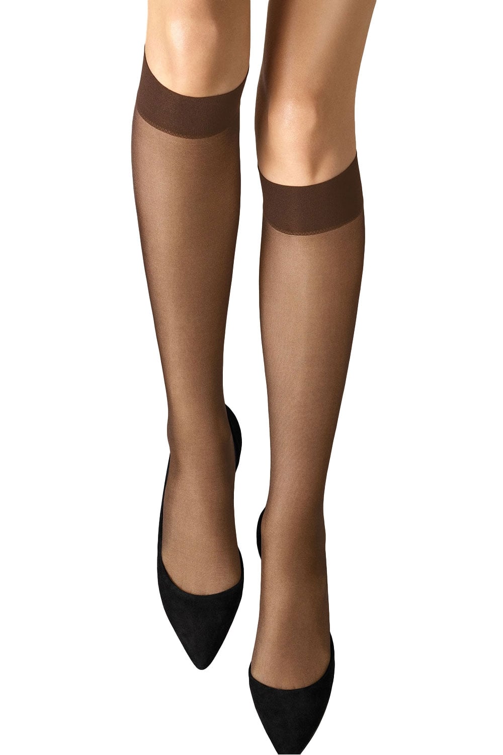 Wolford knee highs with black high heels on a white background