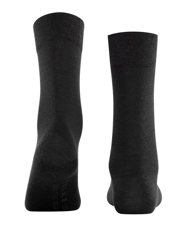 Black  berlin socks on a white background