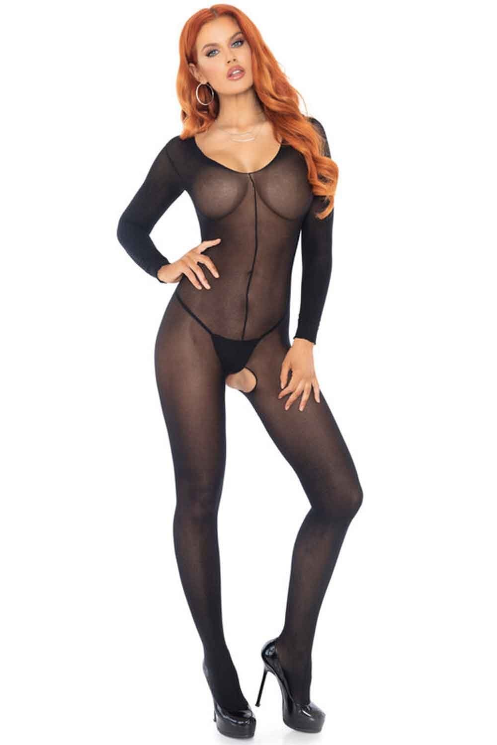 Woman wearing a black bodystocking on a white background