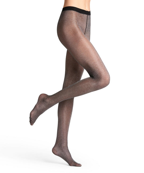 Glitter tights worn by a person on a white background
