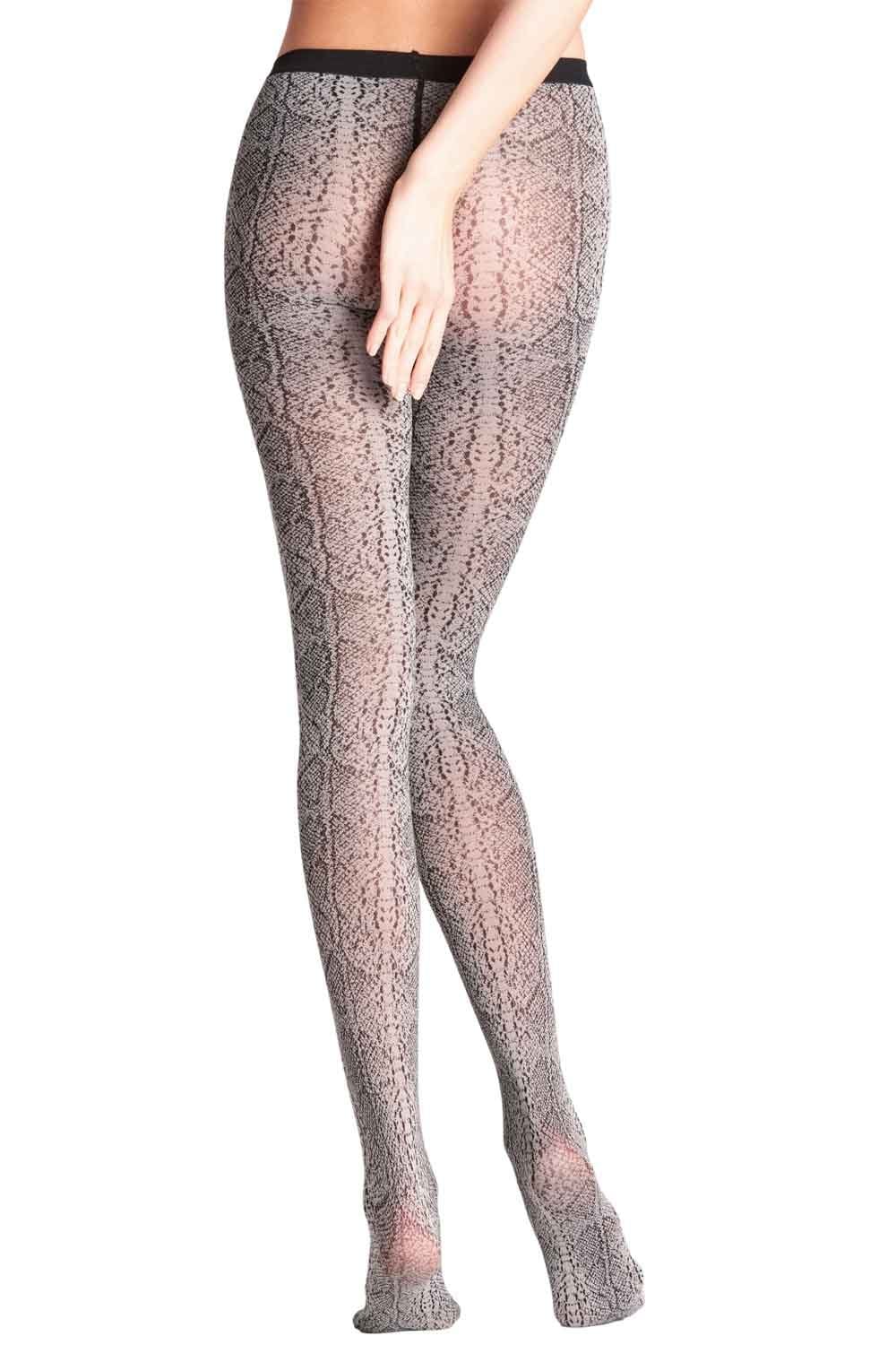 Snake print tights worn by a person on a white background