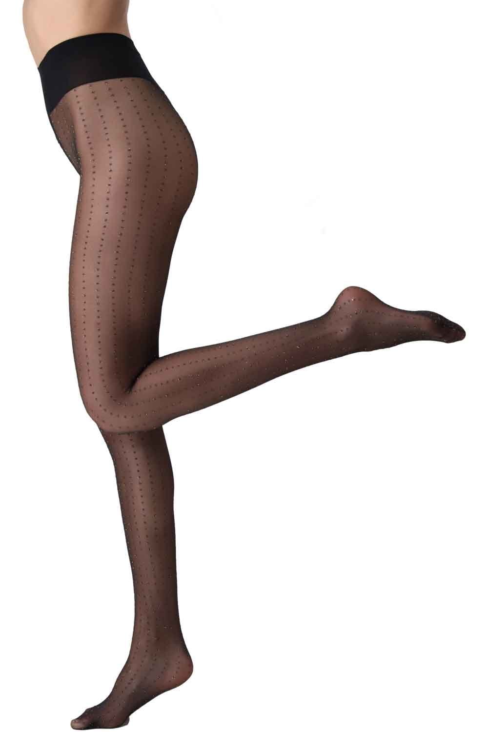 Sparkly glitter dot  tights worn by a person on a white background