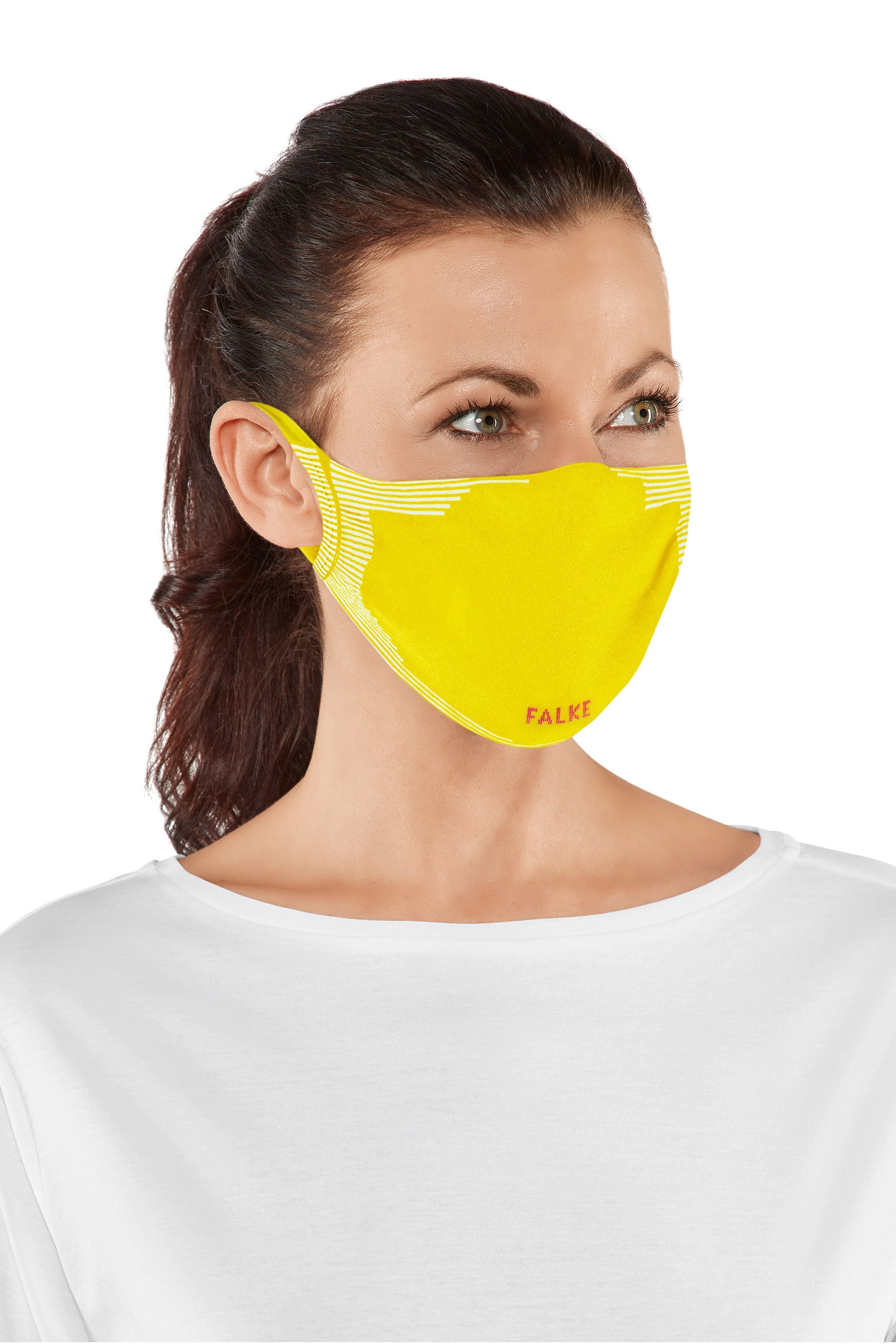 Woman wearing a sunshine coloured face mask with 'Falke branding on a white background