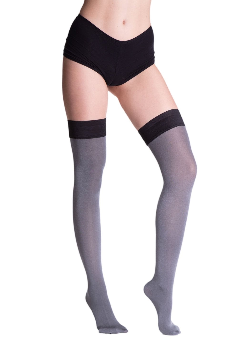 Grey backseam hold ups  with black tops worn by a person on a white background