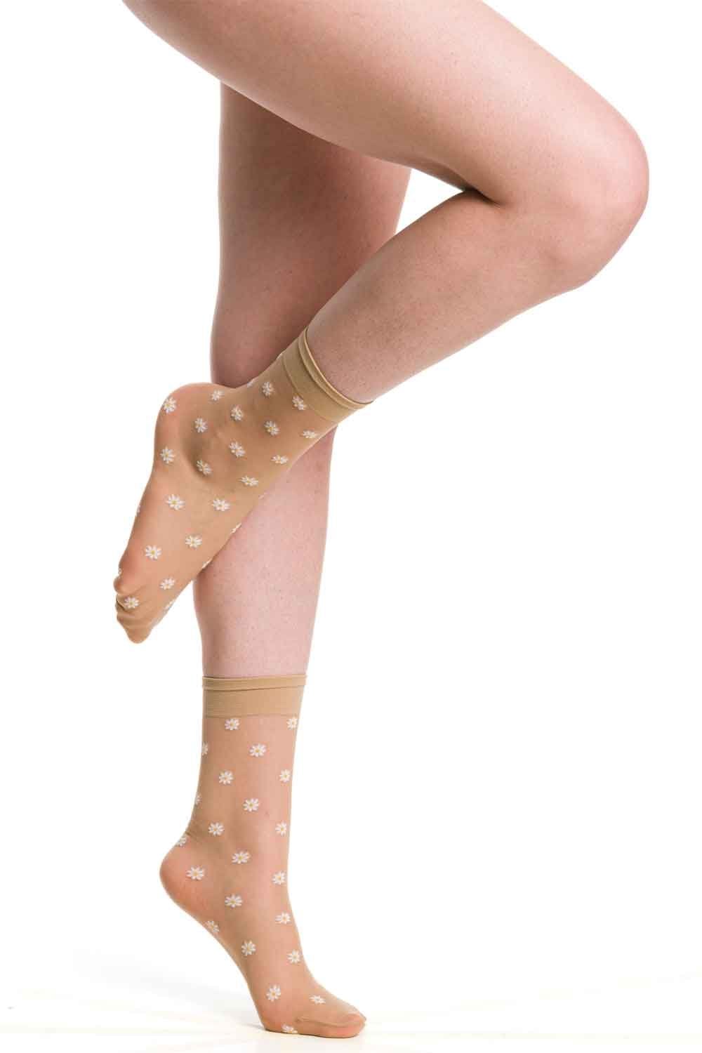 Trasparenze millibar daisy socks  worn by a person on a white background
