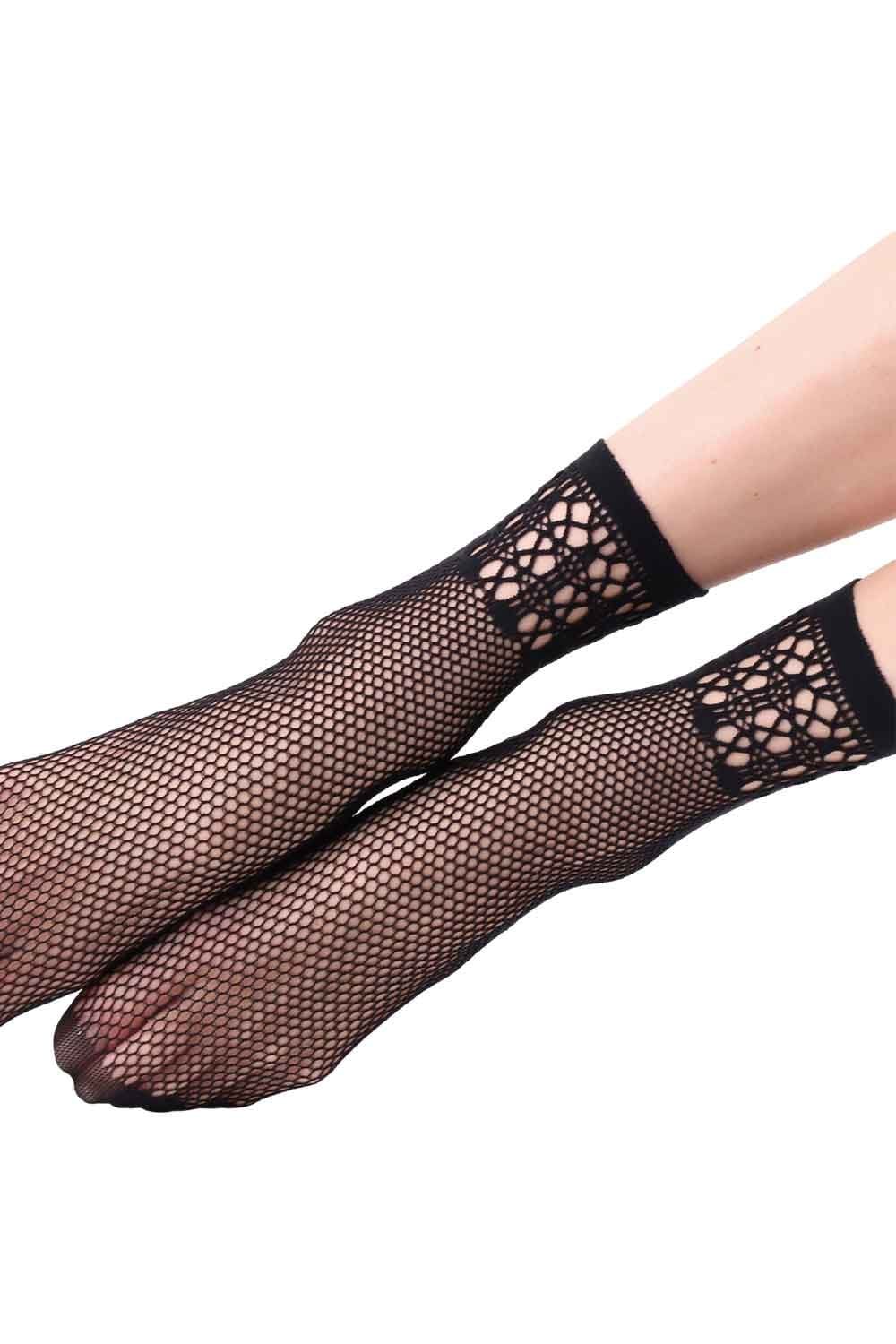 Black net socks on a white background