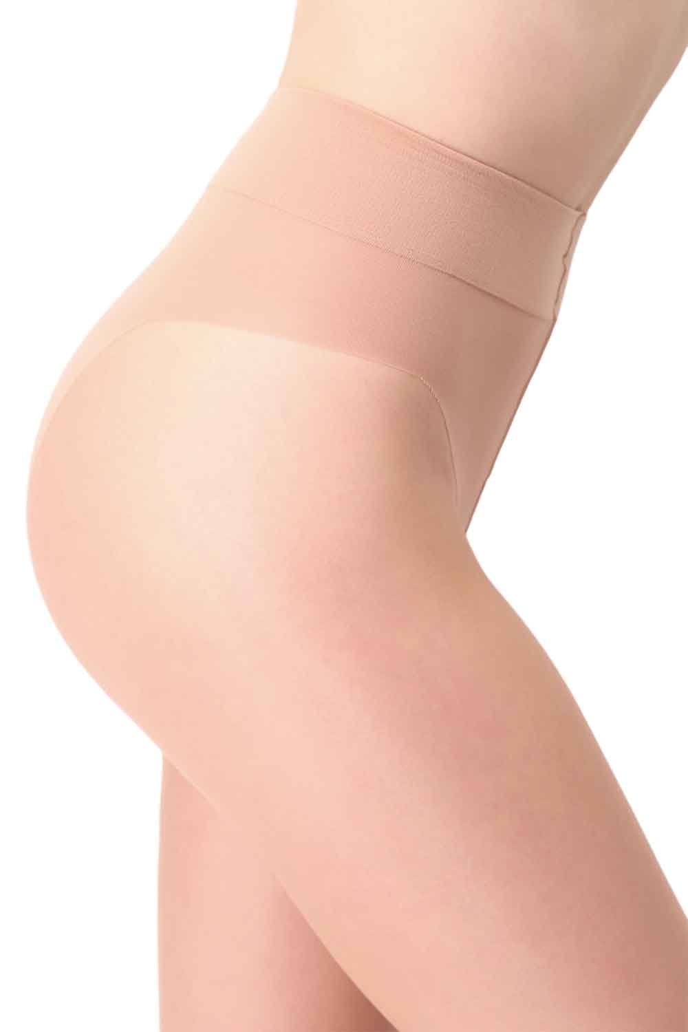 Beige v slim tights worn by a person on a white background