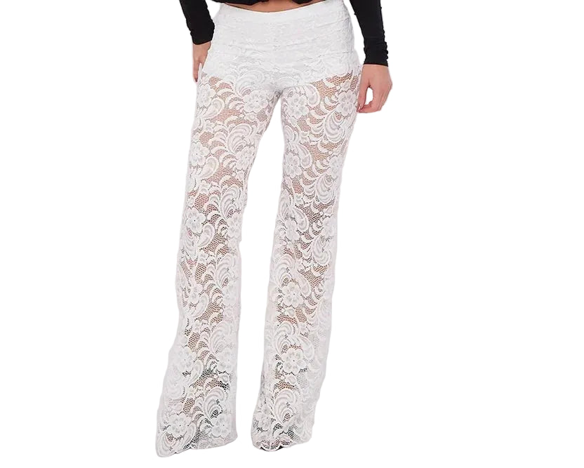 White floral lace wide-leg pants worn by a model, paired with a black long-sleeve top, shown against a plain white studio background.