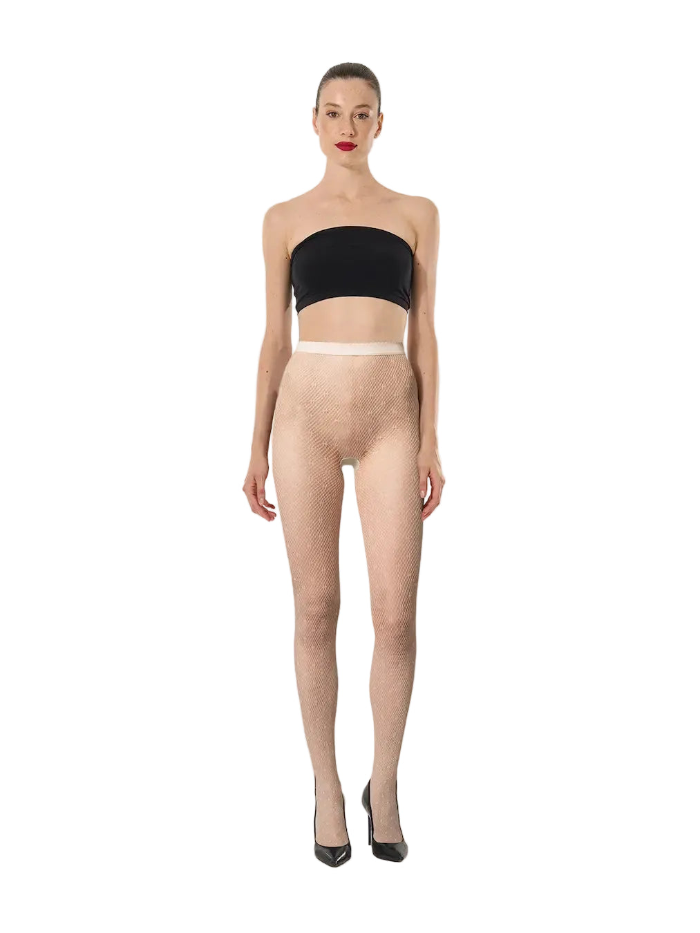 Model wearing  dot net  beige tights and black cropped top on a white background