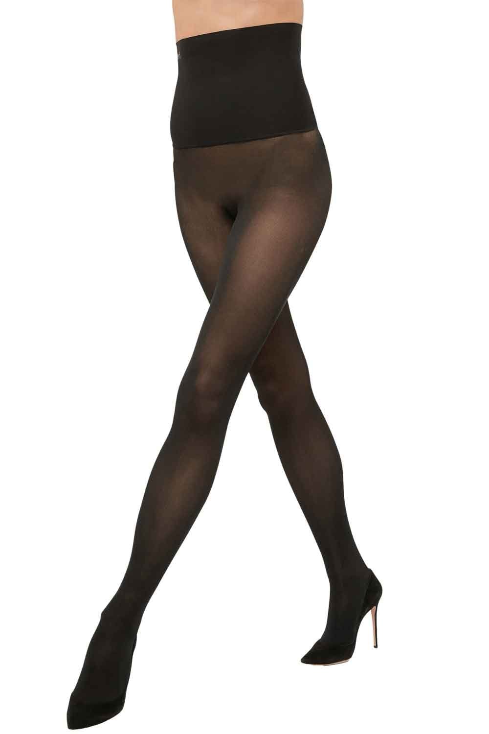 Black high waisted  tights worn by a person on a white background