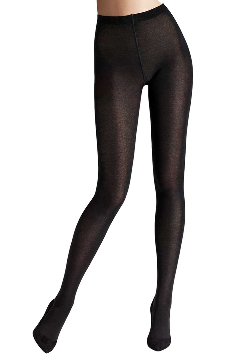 Wolford marino wool black tights on a white background