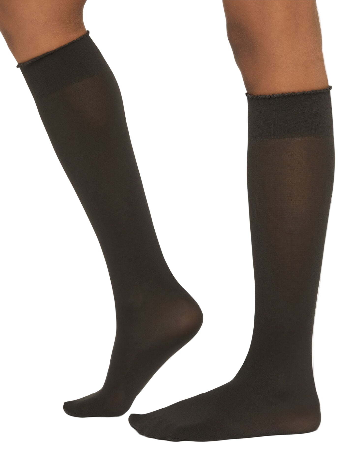Nearly black knee-high socks worn by a model on a white background