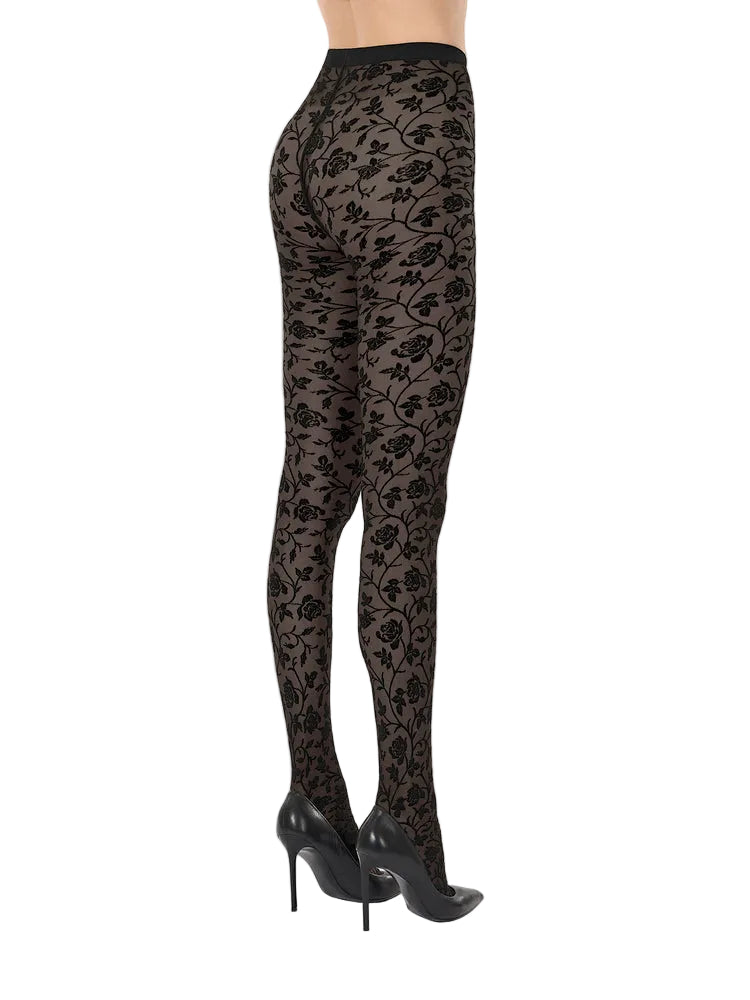Black floral lace tights on a neutral background