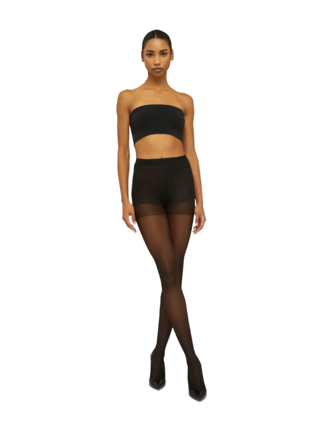 Woman wearing a black strapless top and black tights on a white background