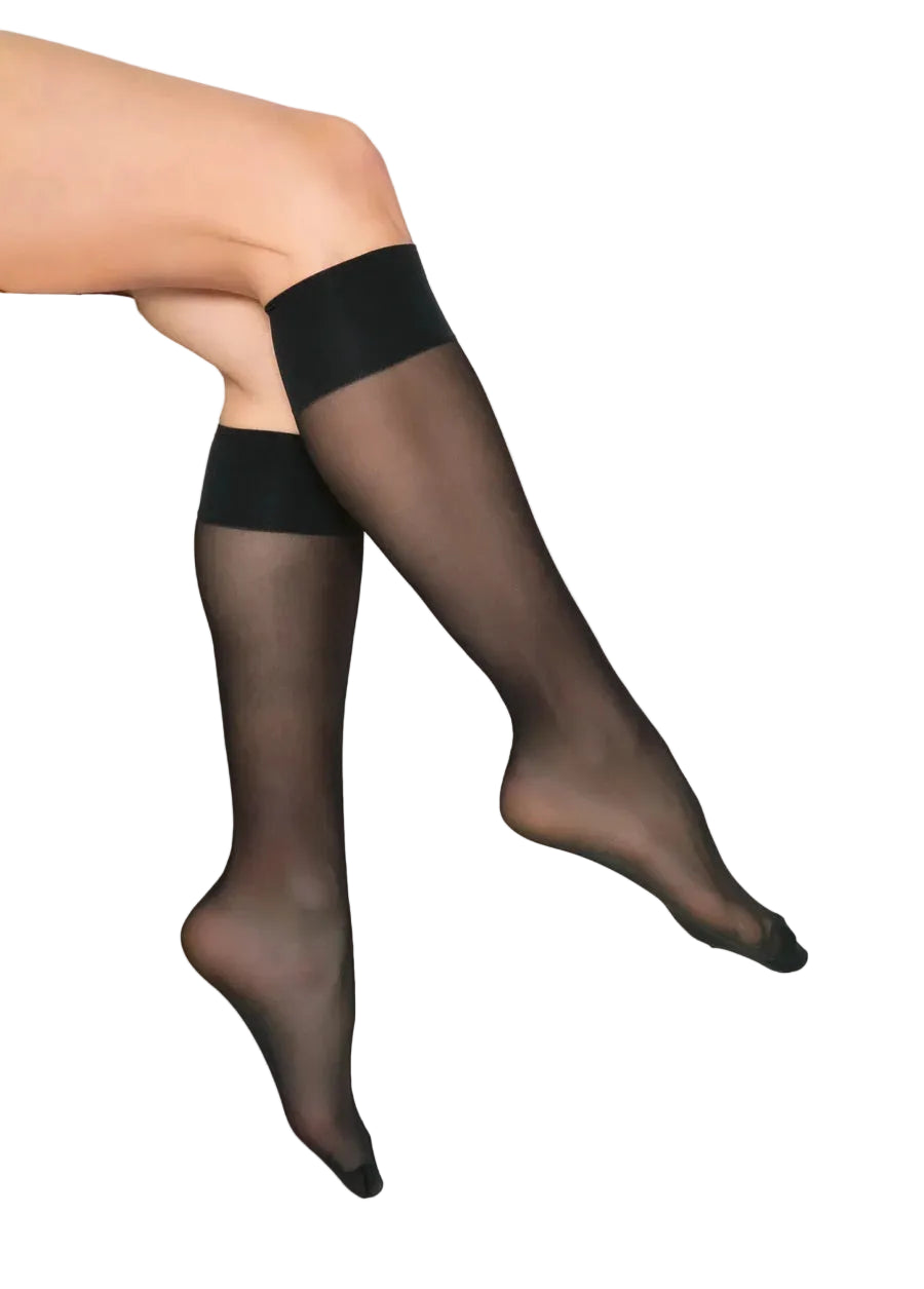 Black sheer knee highs worn on a model's legs, shown against a plain white background.
