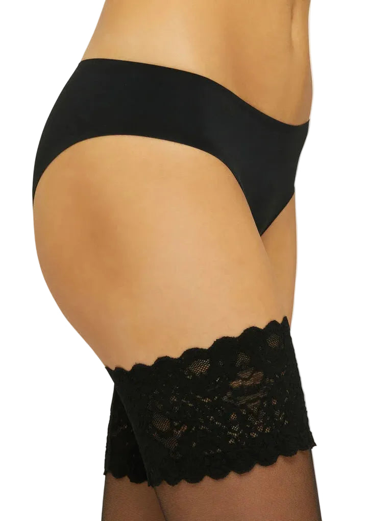 model wearing black lingerie and lace top hold ups