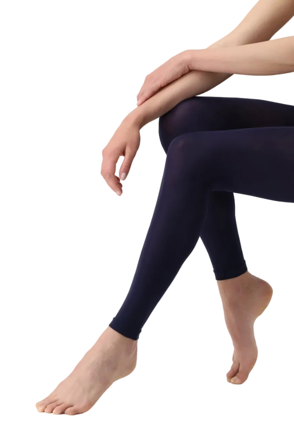 Navy blue leggings worn by a person on a white background
