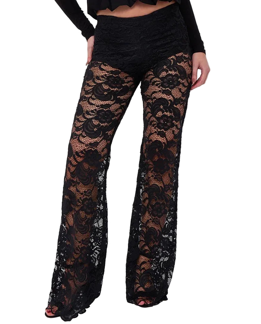 model wearing sheer floral lace trousers with shorts