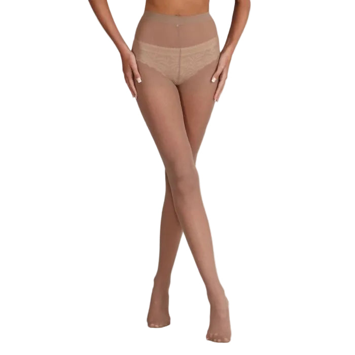 Beige tights worn by a model on a light grey background