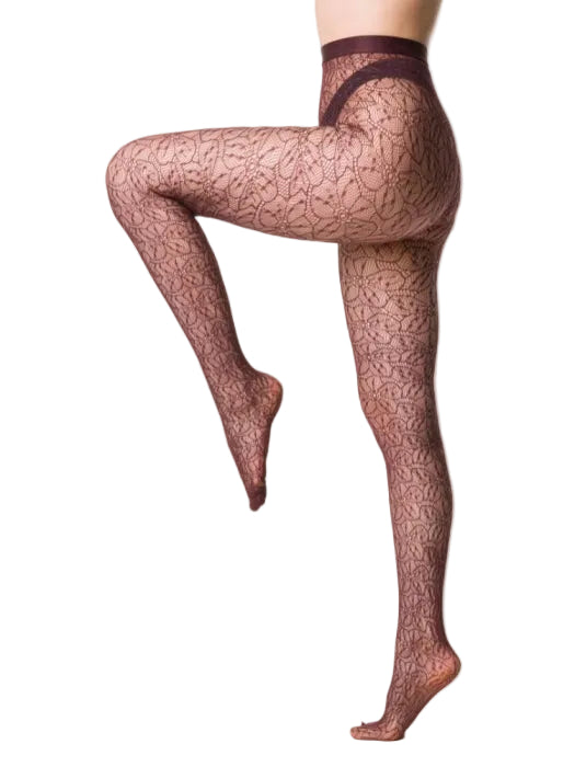 Patterned lace tights worn by a person on a white background 