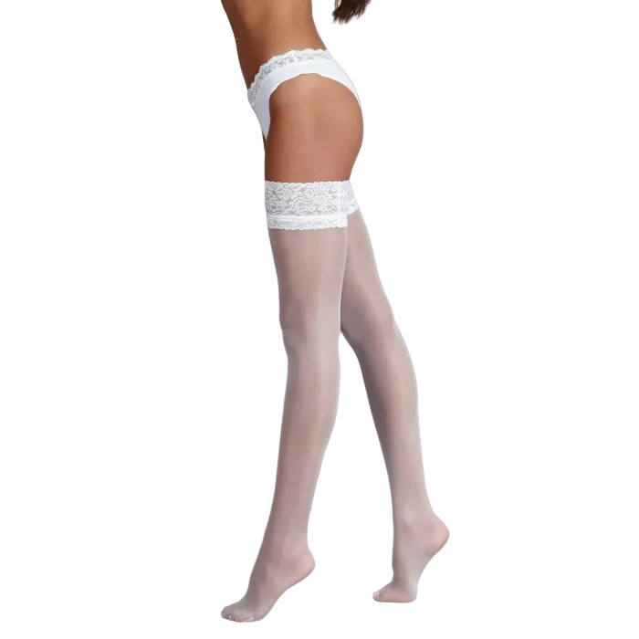 Sheer white hold ups with lace top worn by a person on a white background